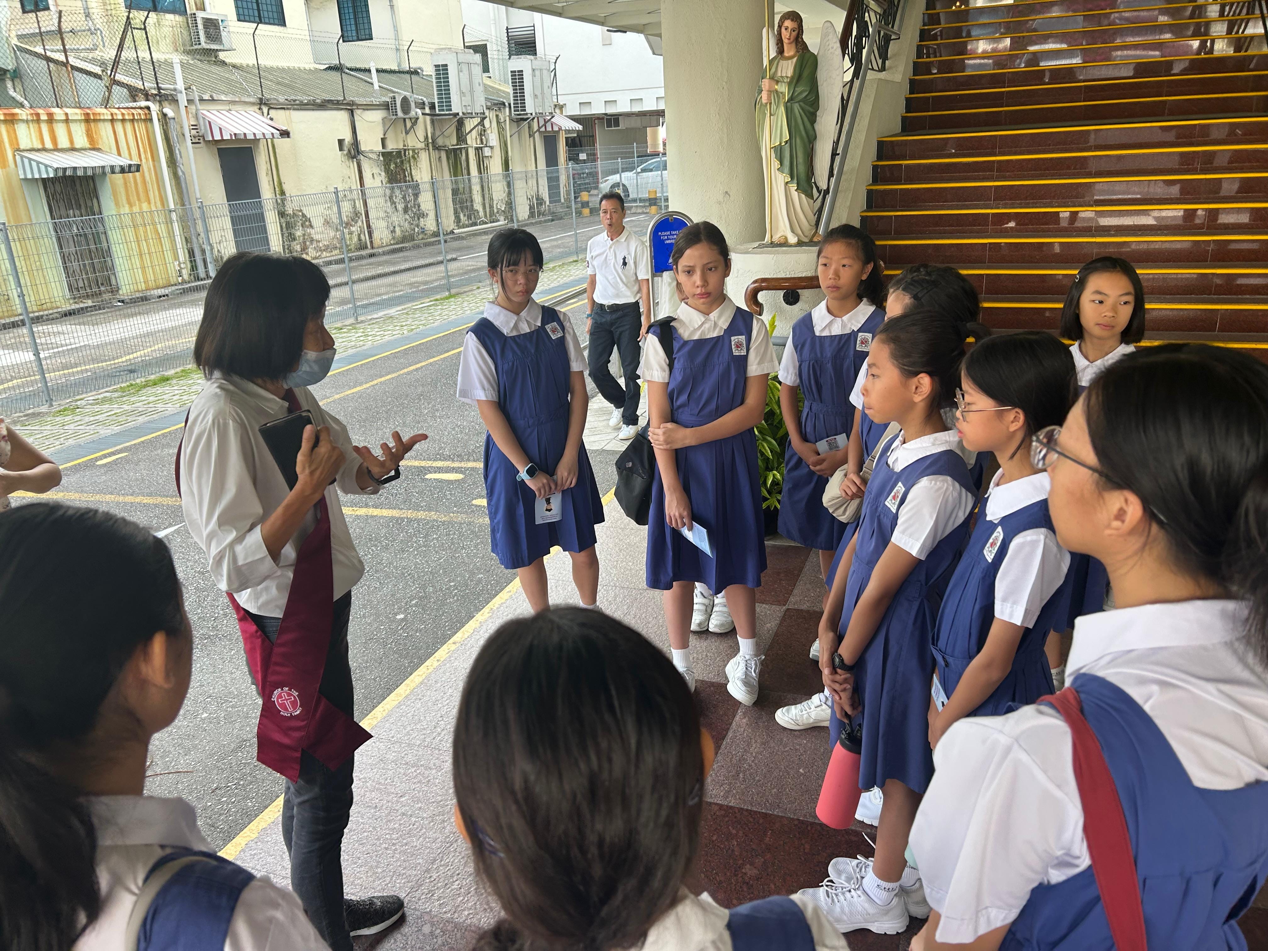 Students serving as lectors and hospitality ministers
